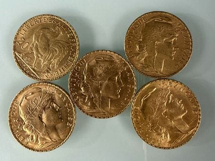 [法国]
5枚20法郎金币（公鸡图案），发行年份分别为1906年（3枚）、1912年（1枚）和191