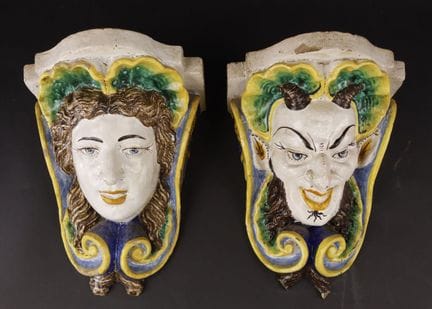 Pair of polychrome earthenware wall sconces, one d