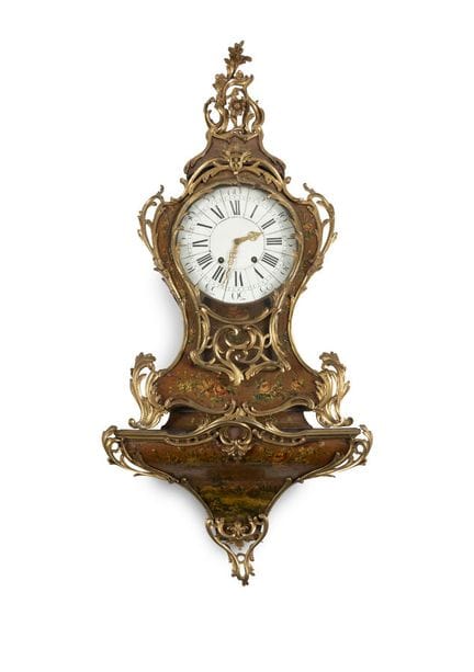 PAINTED WOOD AND GILDED BRONZE WALL CLOCK
decorate