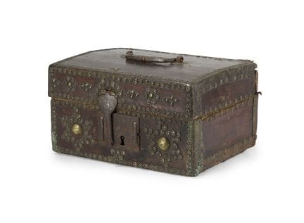 LEATHER CHEST
with a flower-shaped studded design,