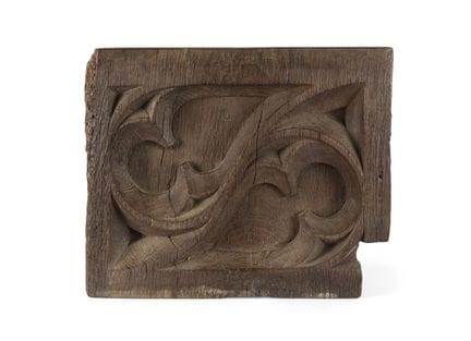 TWO FRAGMENTS OF CARVED OAK PANELING
one decorated