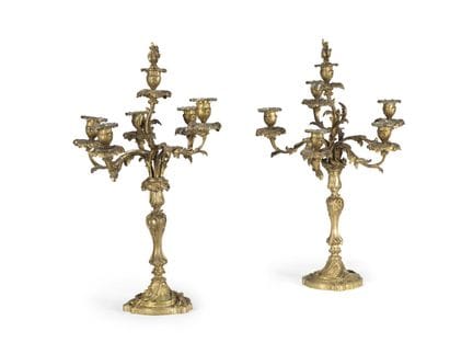 COPPIA DI CANDELABRI IN BRONZO DORATO
a sei bracci