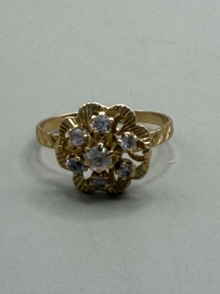 Anello a forma di fiore in oro giallo 750 e pietre