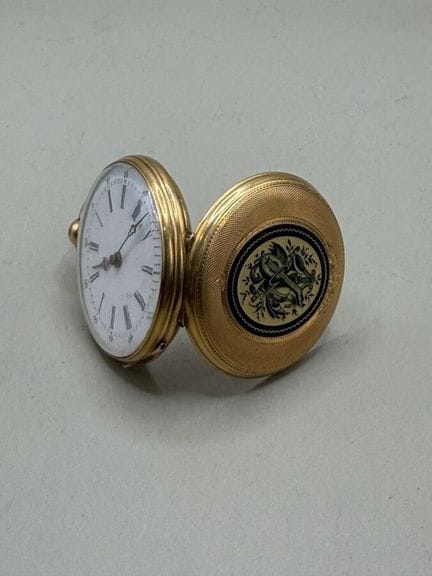 Halskette mit Uhr aus 750er Gelbgold, ziselierter 