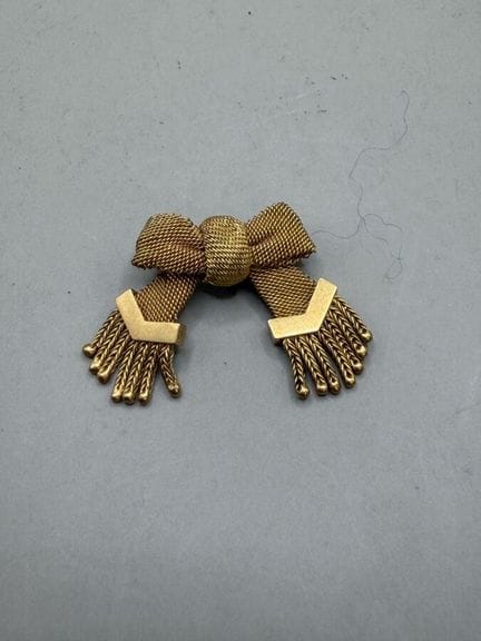 Brosche aus 750er Gelbgold in Form einer Schleife,