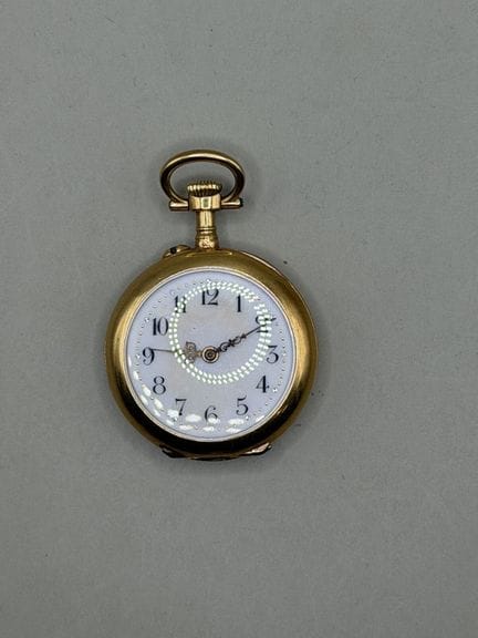 Taschenuhr aus 750er Gelbgold, Rückseite mit Blatt