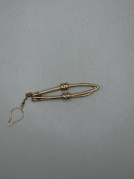 Krawattenklammer aus 750er Gelbgold, mit Godron-Mu