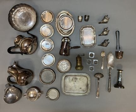A set of silver plated metal items: a tripod bowl,