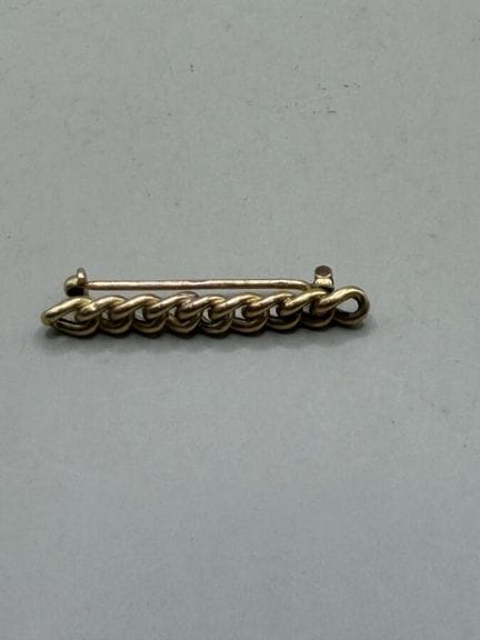 Brosche aus 750er Gelbgold mit einreihigen Panzerk