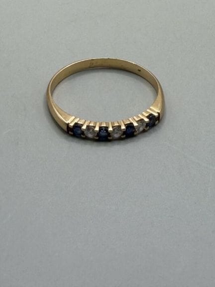 Mezzo anello in oro giallo 750, con quattro zaffir