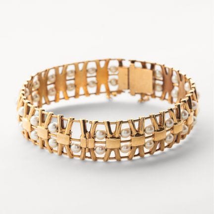 Pulsera esclava de calado geométrico en oro con do