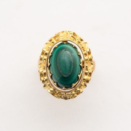 Ring in matte and polished gold with an openwork b