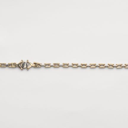 Geometric openwork bracelet in two-tone gold with 