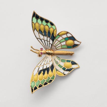 Butterfly-shaped brooch in matte and polished gold