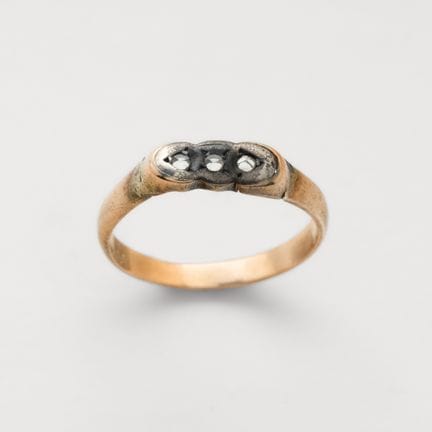 14K gold three-stone ring with platinum settings a