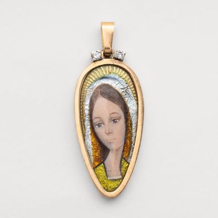 Devotional medal pendant in an almond-shaped desig