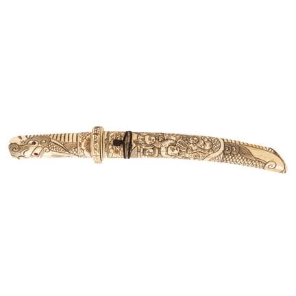 Japanese carved and inlaid bone sword with a handl