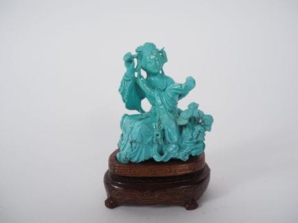 Cina, XX secolo
Statuetta in turchese raffigurante