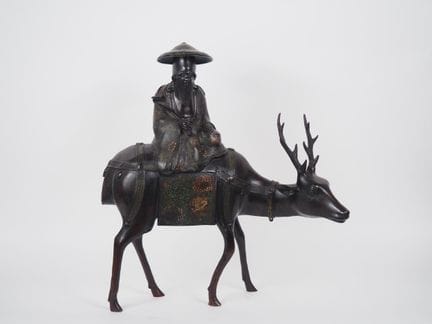 Japon, vers 1900
Okimono en bronze de patine brune