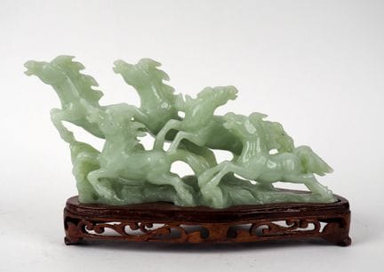 Cina, XX secolo
Gruppo a serpentina raffigurante c