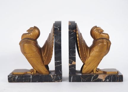 C. CHARLES. 
Pair of bookends in gilded patinated 