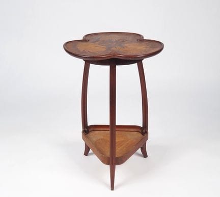 MAJORELLE. 
Side table with a multi-lobed, inlaid 