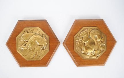 F. THENOT. 
Pair of repoussé metal plaques decorat