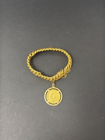 Bracciale in oro giallo (750/00), a maglia intrecc
