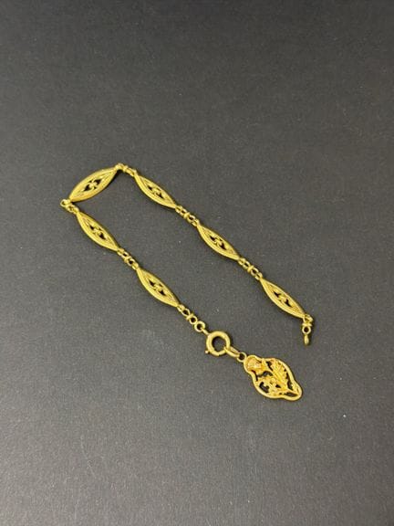 Bracciale in oro giallo (750/00) con maglie trafor