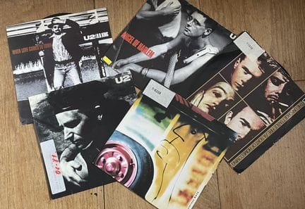 80年代摇滚
五张45转黑胶唱片——U2
品相从VG到EX；品相从VG到EX