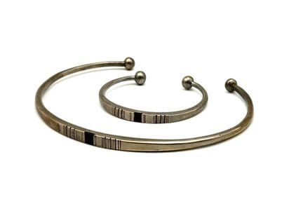 Set composto da BRACCIALE e COLLANA Torque in meta
