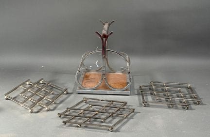 JACQUES ADNET (in stile). Set in metallo argentato