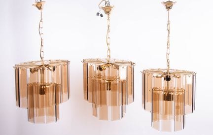 Design anni '60
Incontro di tre lampadari con stru