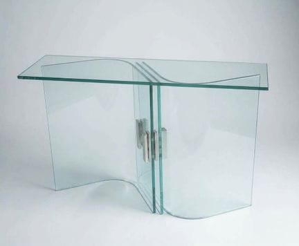 Console in vetro con staffe in metallo cromato 
Ci