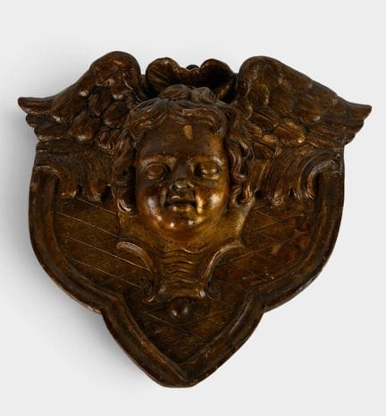 Religiöses Dekorationselement
Aus Holz. Cherub im 