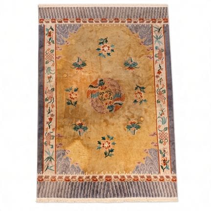CHINA
Hand-knotted wool rug with a polychrome desi