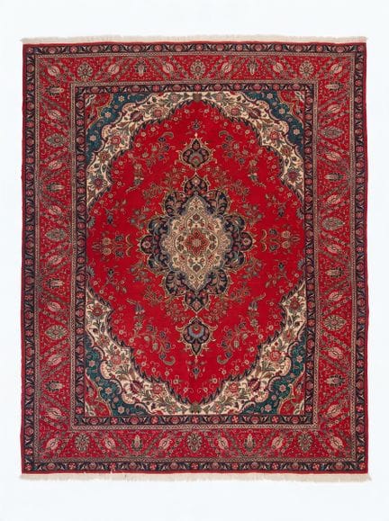 IRAN
Hand-knotted wool rug with a central medallio