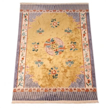 CHINA
Hand-knotted wool rug with a polychrome desi
