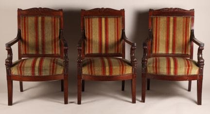 Suite de six fauteuils en acajou et placage d’acaj