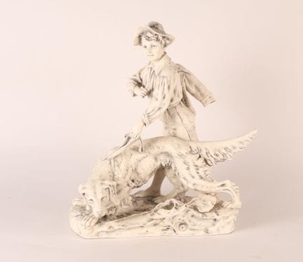 ROYAL DUX - BOHEMIA 
Jeune garçon au chien 
Statue