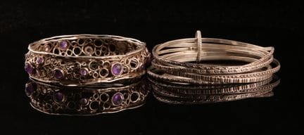Set of two bracelets:
- Seven-link chiseled silver
