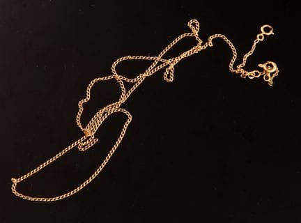 18-karat yellow gold (750) chain with a curb link 