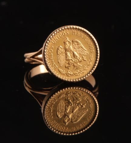 Bague en or jaune 18 carats (750 millièmes) sertie