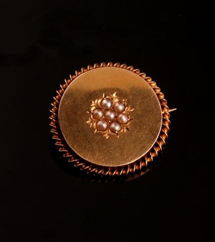 Broche de forme circulaire en or jaune 18 carats (