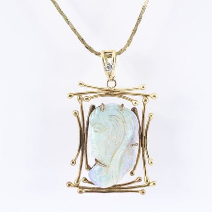 Ciondolo in oro giallo e bianco 18 K (750‰) ornato