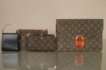 Louis Vuitton, Cartier
Pochette [2], portafogli [2