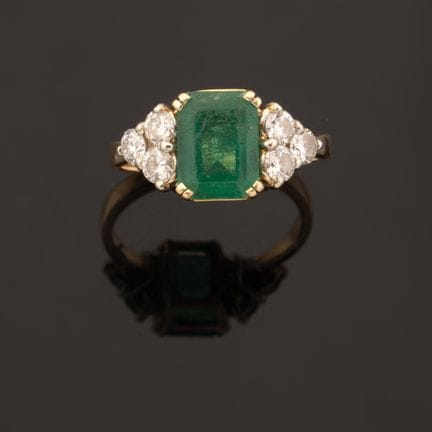 Emerald and Diamond Ring
Set with a rectangular-cu