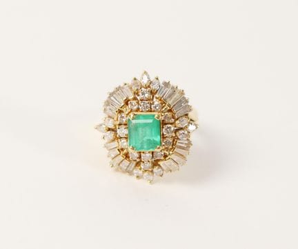Emerald and Diamond Ring
Set with a rectangular-cu