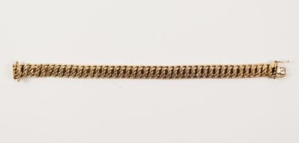 18K (750) yellow gold American-link bracelet 
L. 1