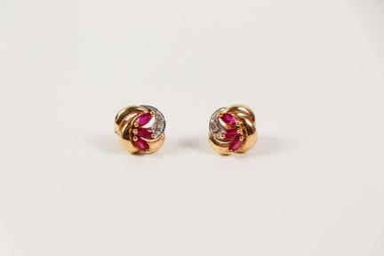 Pair of 18K yellow gold (750) earrings set with ru